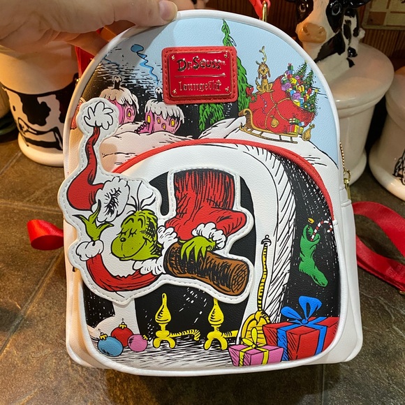 Loungefly Handbags - Loungefly Grinch backpack EEEUC (firm on price)